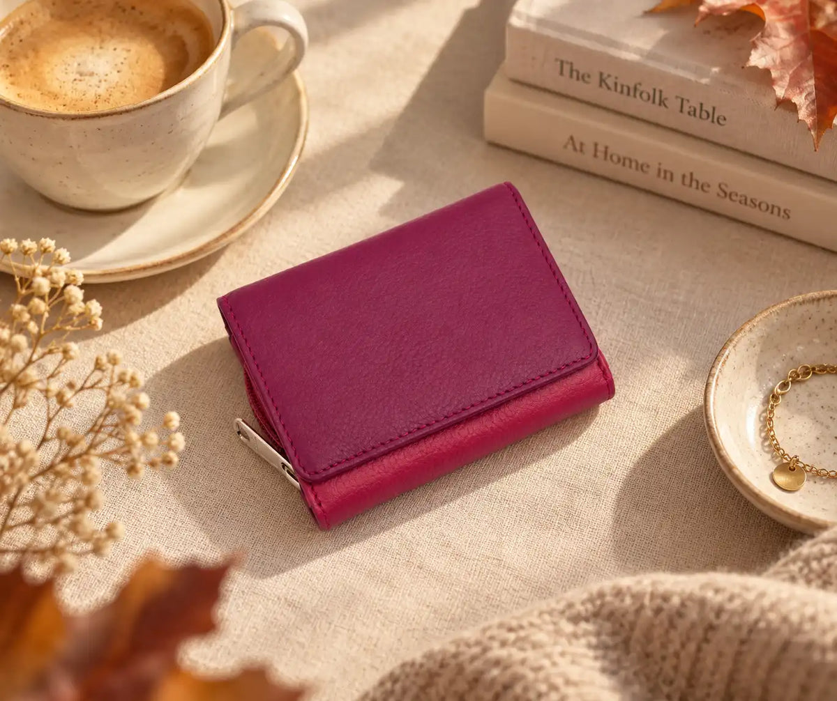Purple multi colour leather purse showing card slots and banknote storage