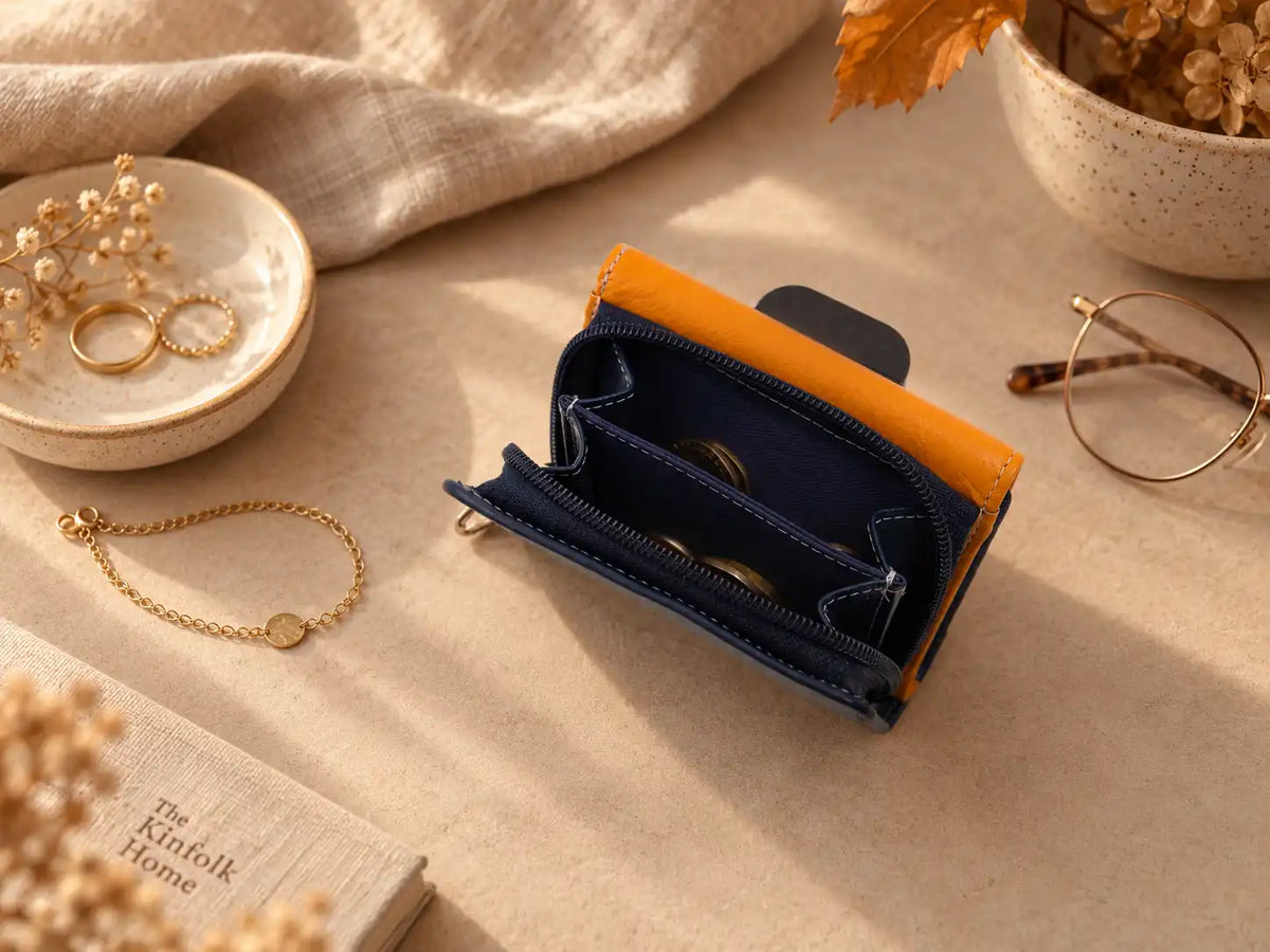 Orange and navy leather purse with zipped coin compartment