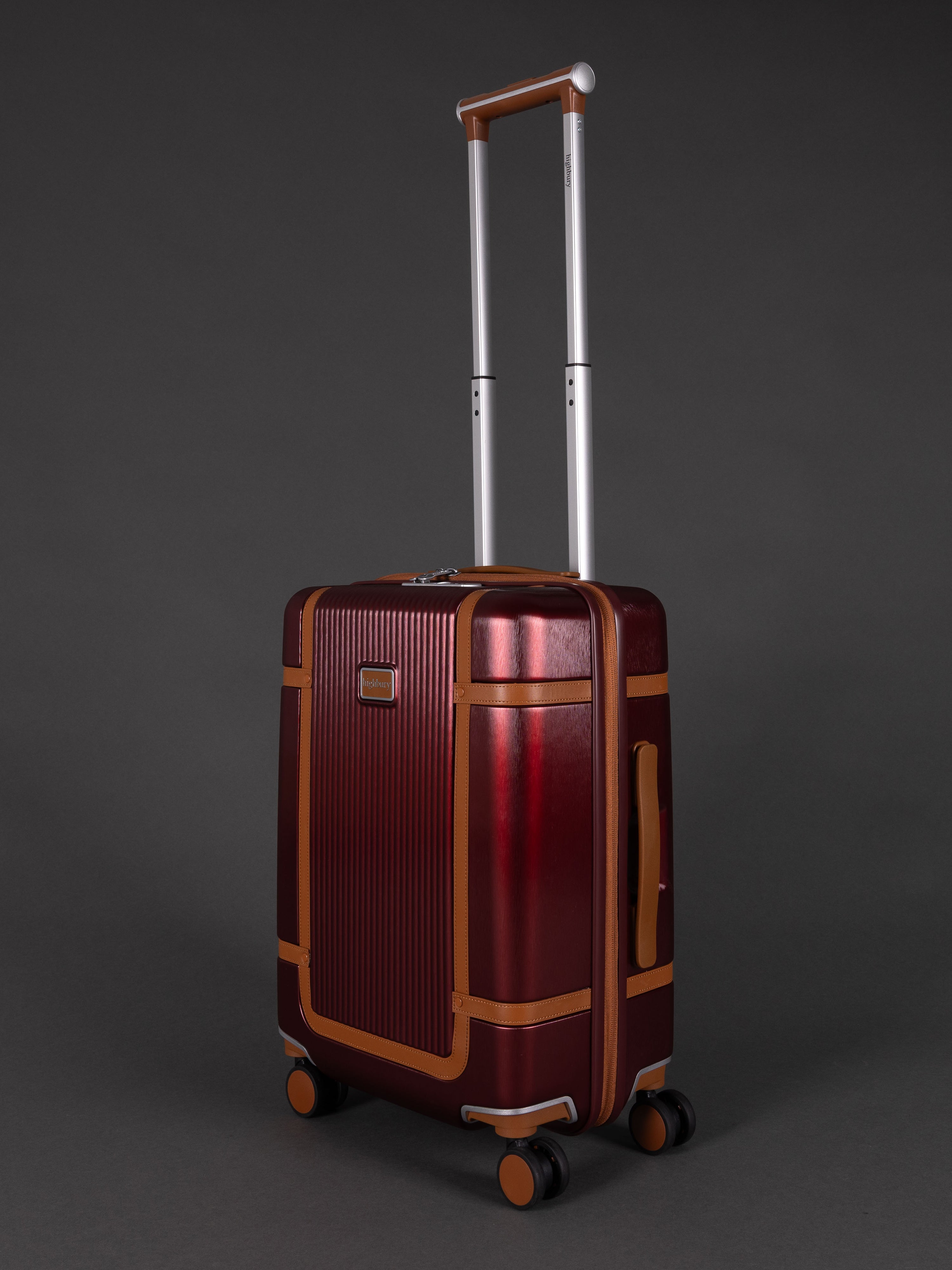 "Burgundy hard shell suitcase with TSA lock and spinner wheels"