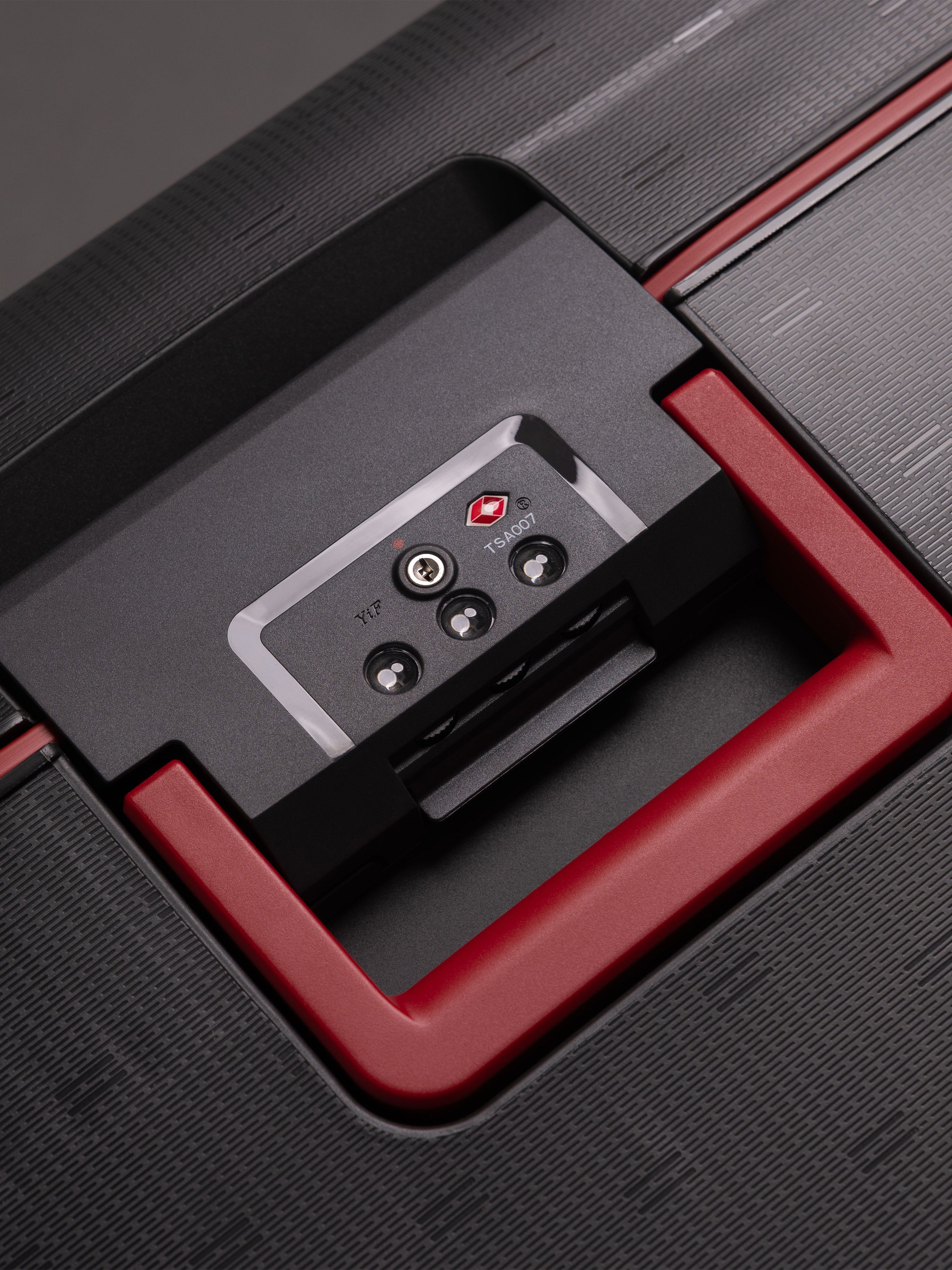 "Dark grey hard shell suitcase with TSA lock and 8 wheels"