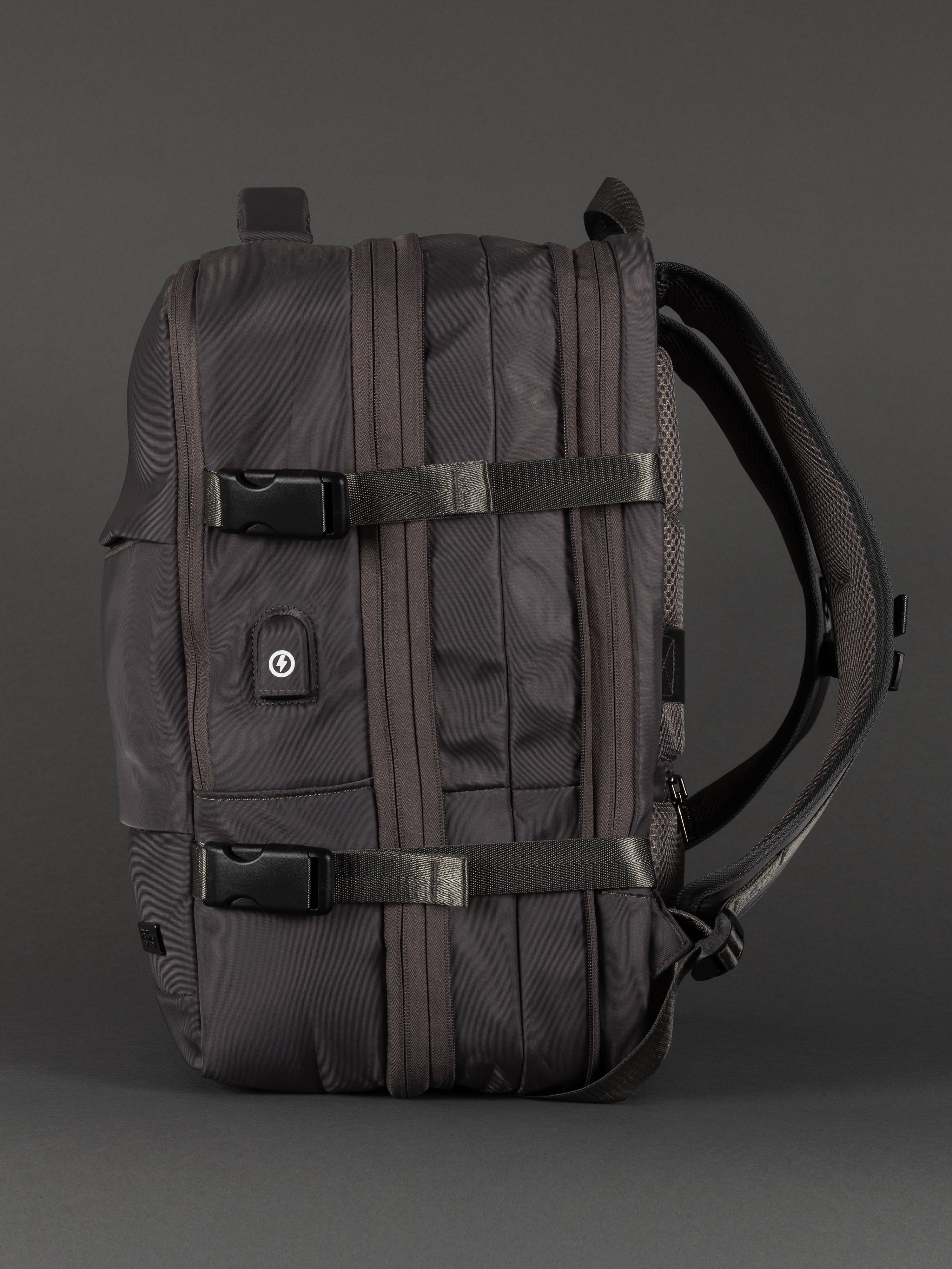 "Durable grey polyester expandable cabin-size backpack"