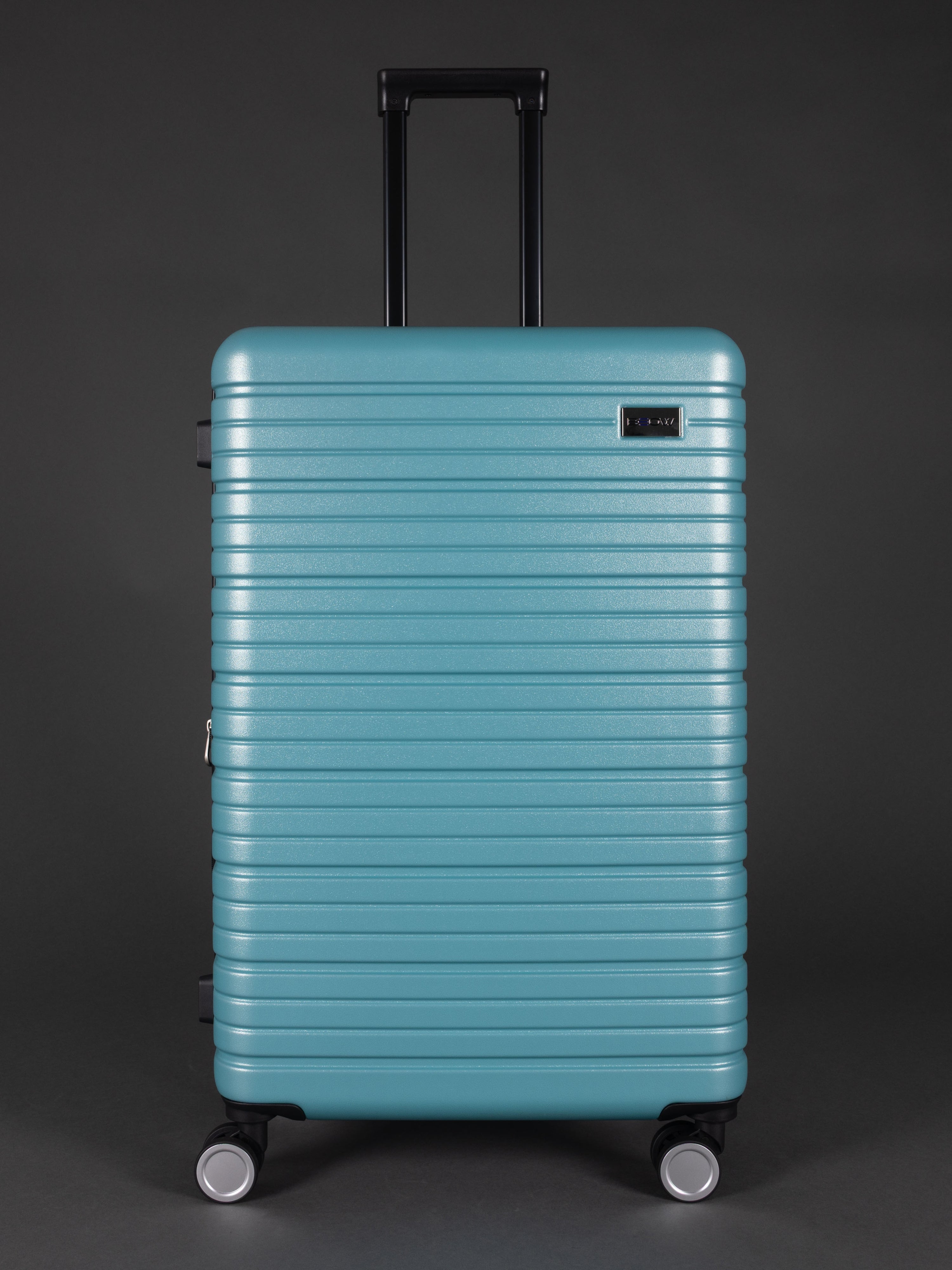 “Teal hard shell suitcase set with 20, 24, 28 inch sizes and spinner wheels”