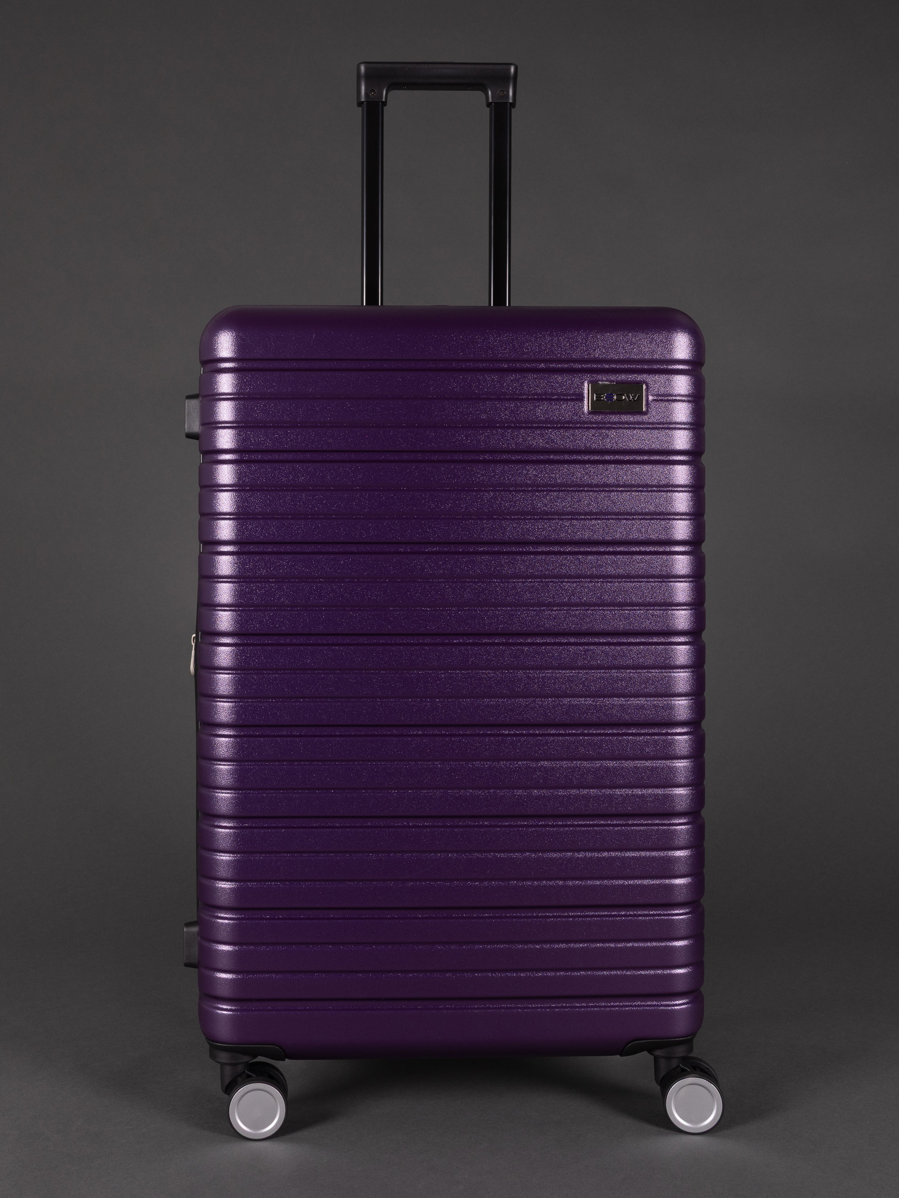 “Durable lightweight purple suitcase set with spinner wheels”