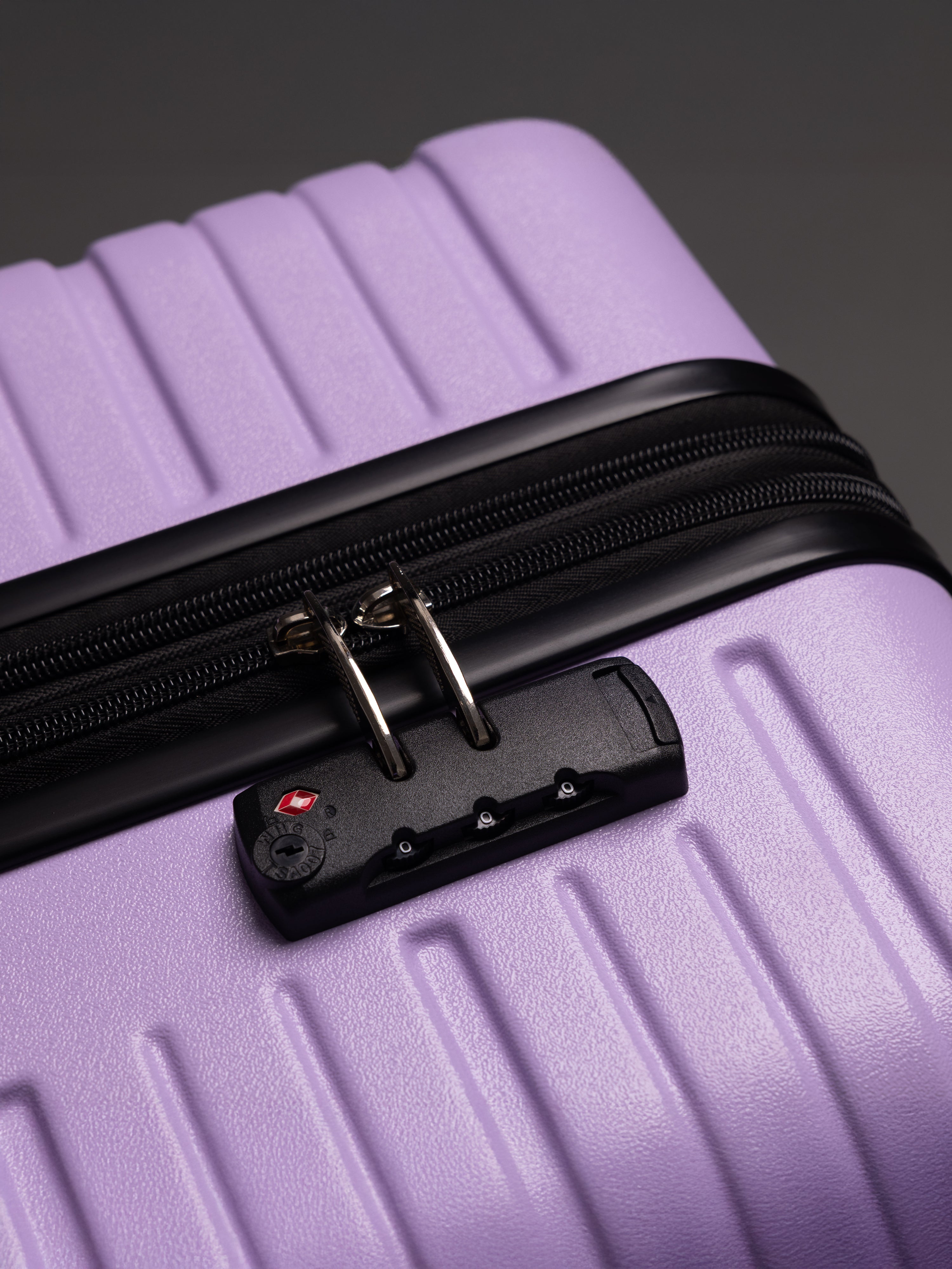 “Close-up of TSA lock on BEOW 3 piece luggage set for secure international travel”