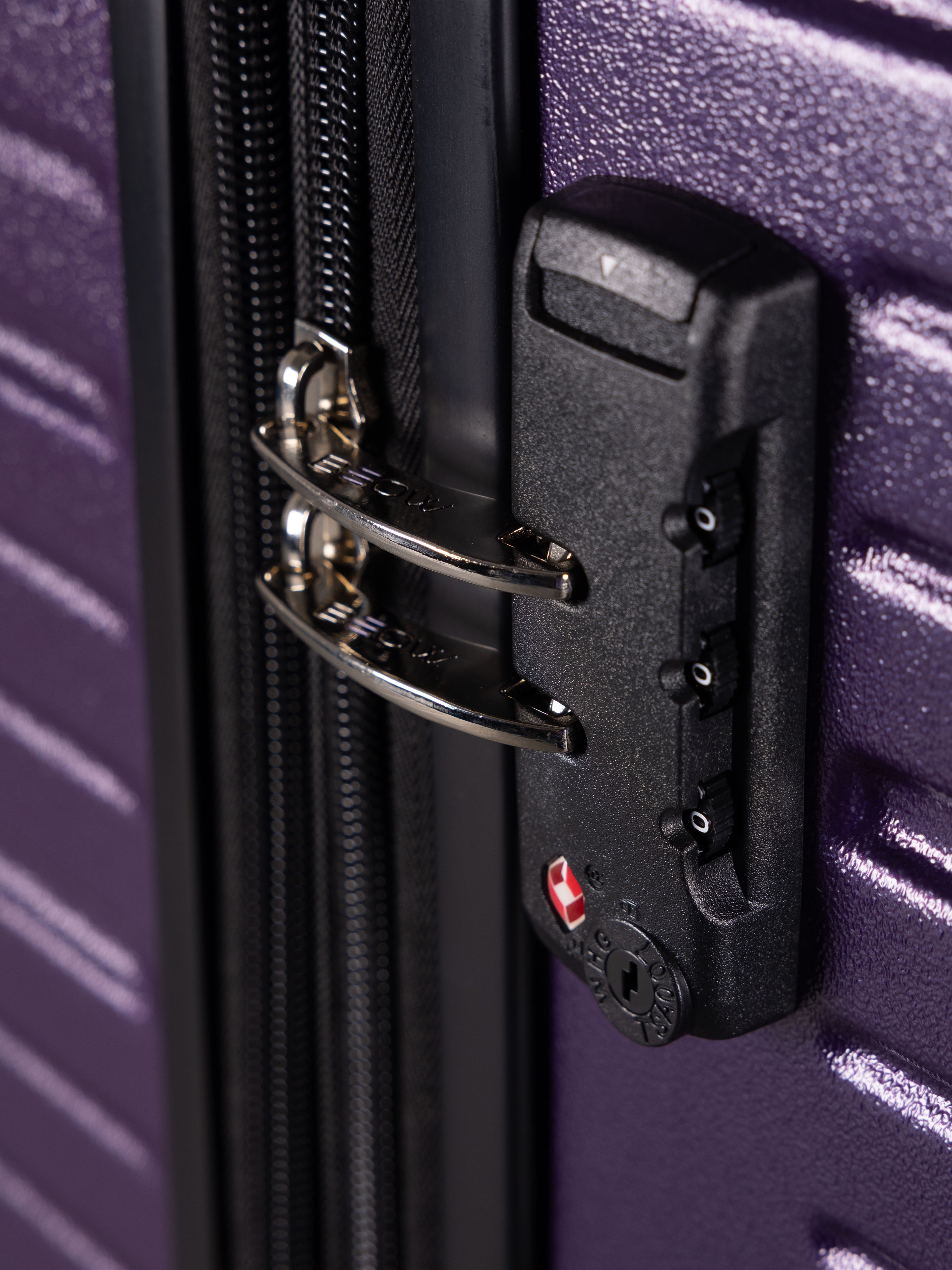 “Close-up of TSA lock on BEOW 3 piece luggage set for secure international travel”