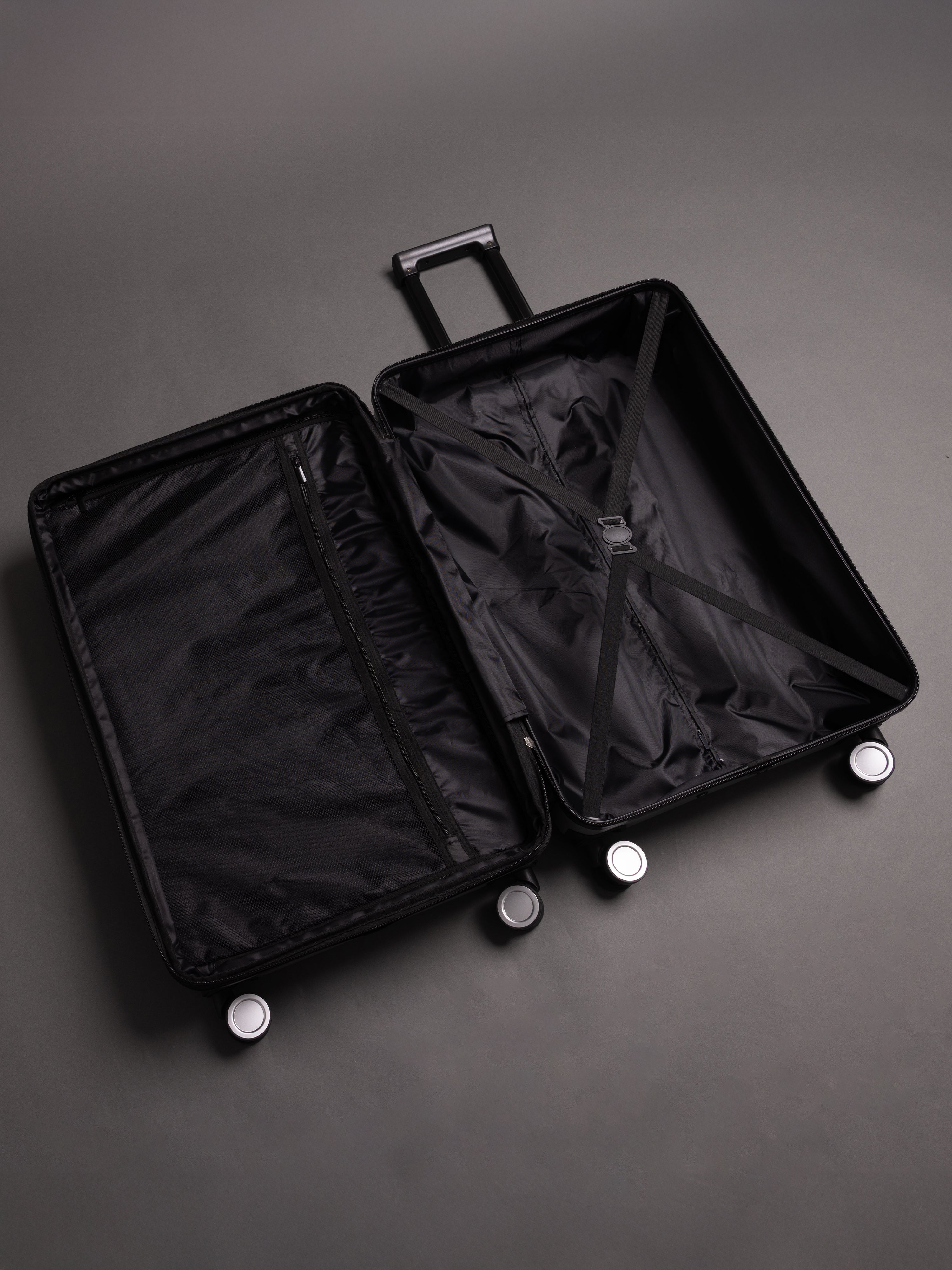 “Interior view of BEOW expandable suitcase with spacious compartments and elastic straps”