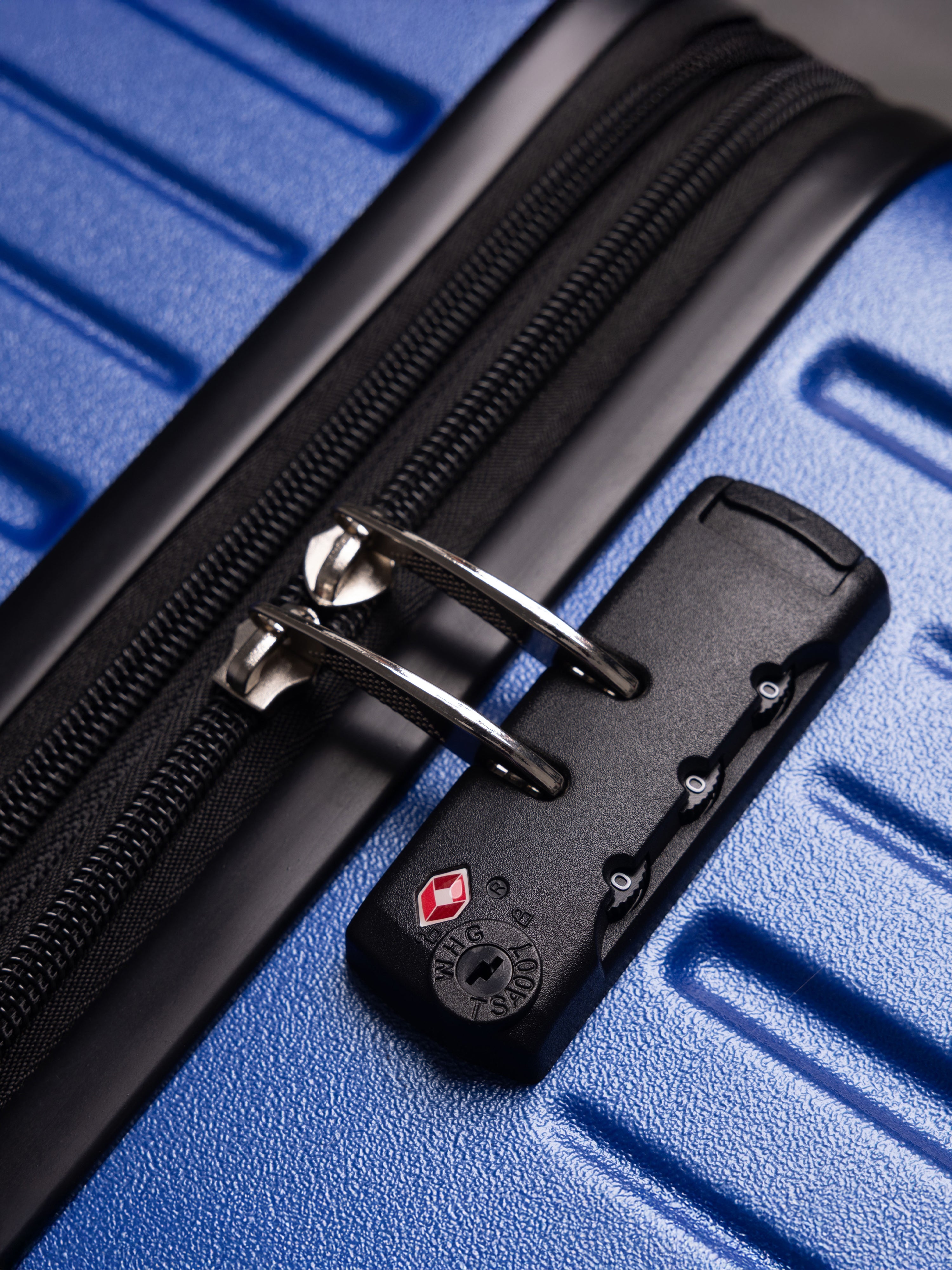 “Close-up of TSA lock on BEOW 3 piece luggage set for secure international travel”