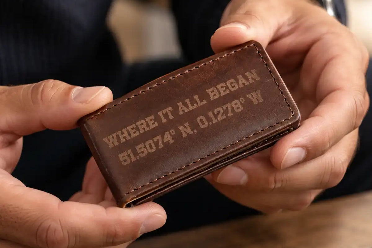 Engraved dark brown leather money clip wallet with personalised coordinates