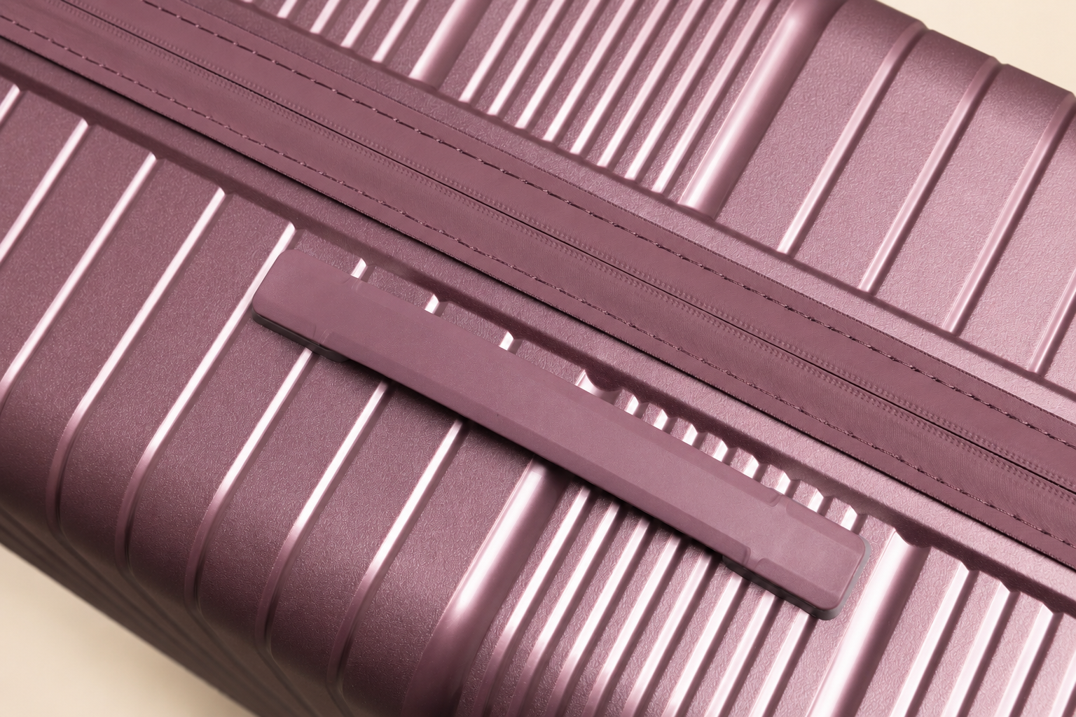 Why Purple Luggage Is the Colour of Travellers Who Refuse to Follow the Crowd