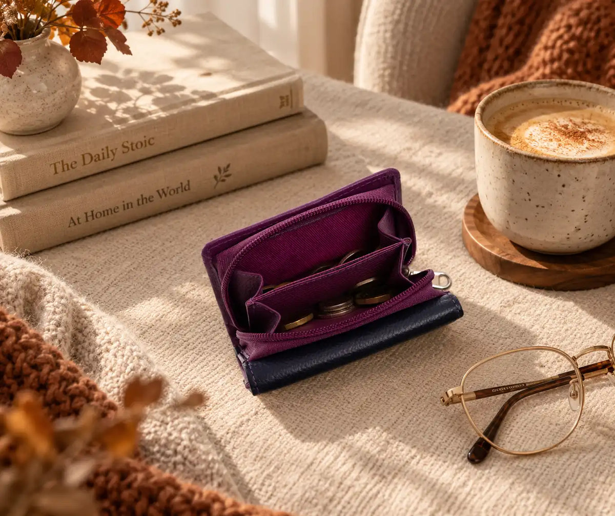 Navy leather purse with purple zipped coin compartment