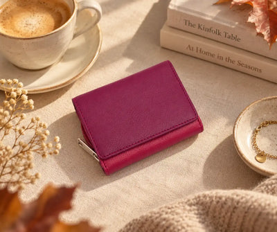 Purple multi colour leather purse showing card slots and banknote storage
