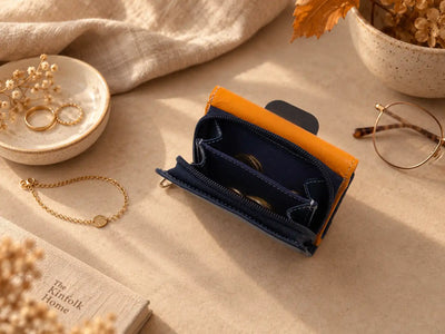 Orange and navy leather purse with zipped coin compartment