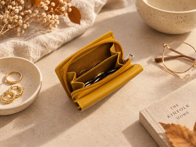 Mustard yellow leather purse with open zipped coin compartment