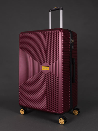 "29 inch large burgundy suitcase with 8 wheels"