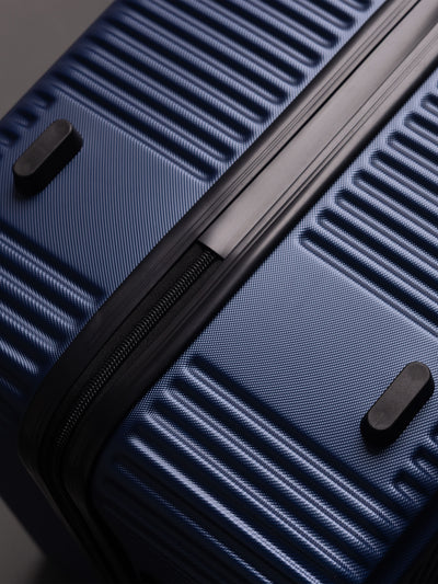 Highbury Navy Hardside 4-Piece Luggage Set – Polypropylene Suitcases with 8 Spinner Wheels (14", 16", 25", 29")