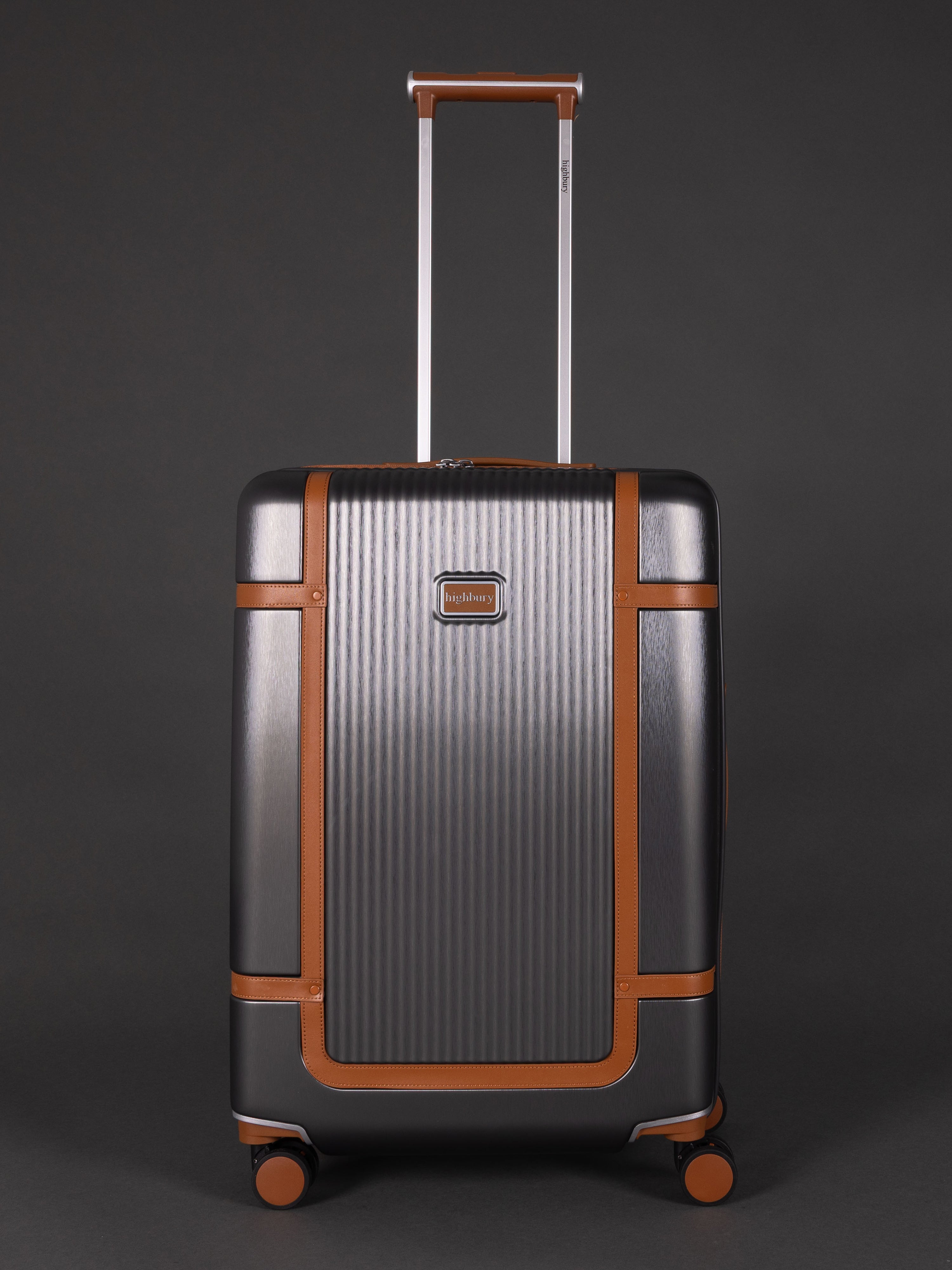 "25 inch medium Dark Grey hard shell suitcase with TSA lock"