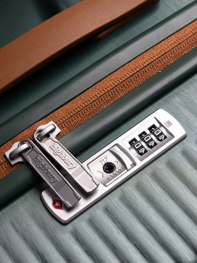 "Green hard shell suitcase with TSA lock and spinner wheels"