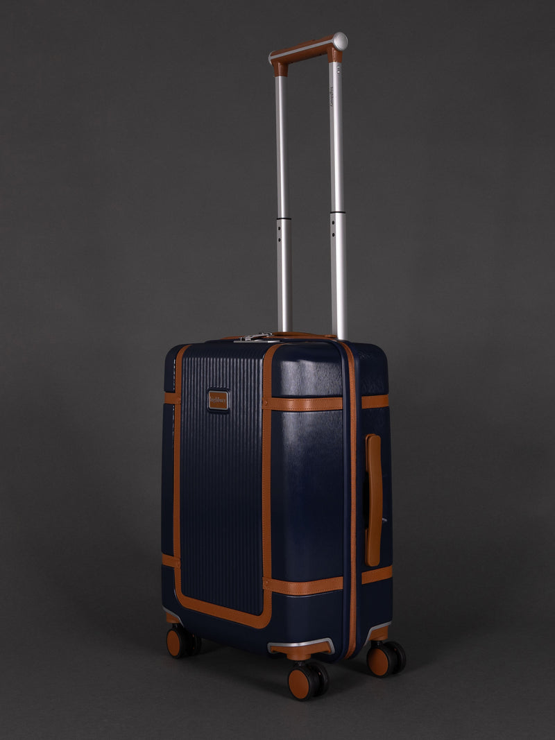 "Navy hard shell suitcase with TSA lock and spinner wheels"