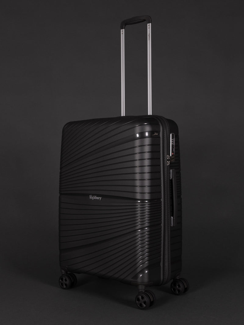 "Ultra-light dark grey polypropylene spinner suitcase with TSA lock"