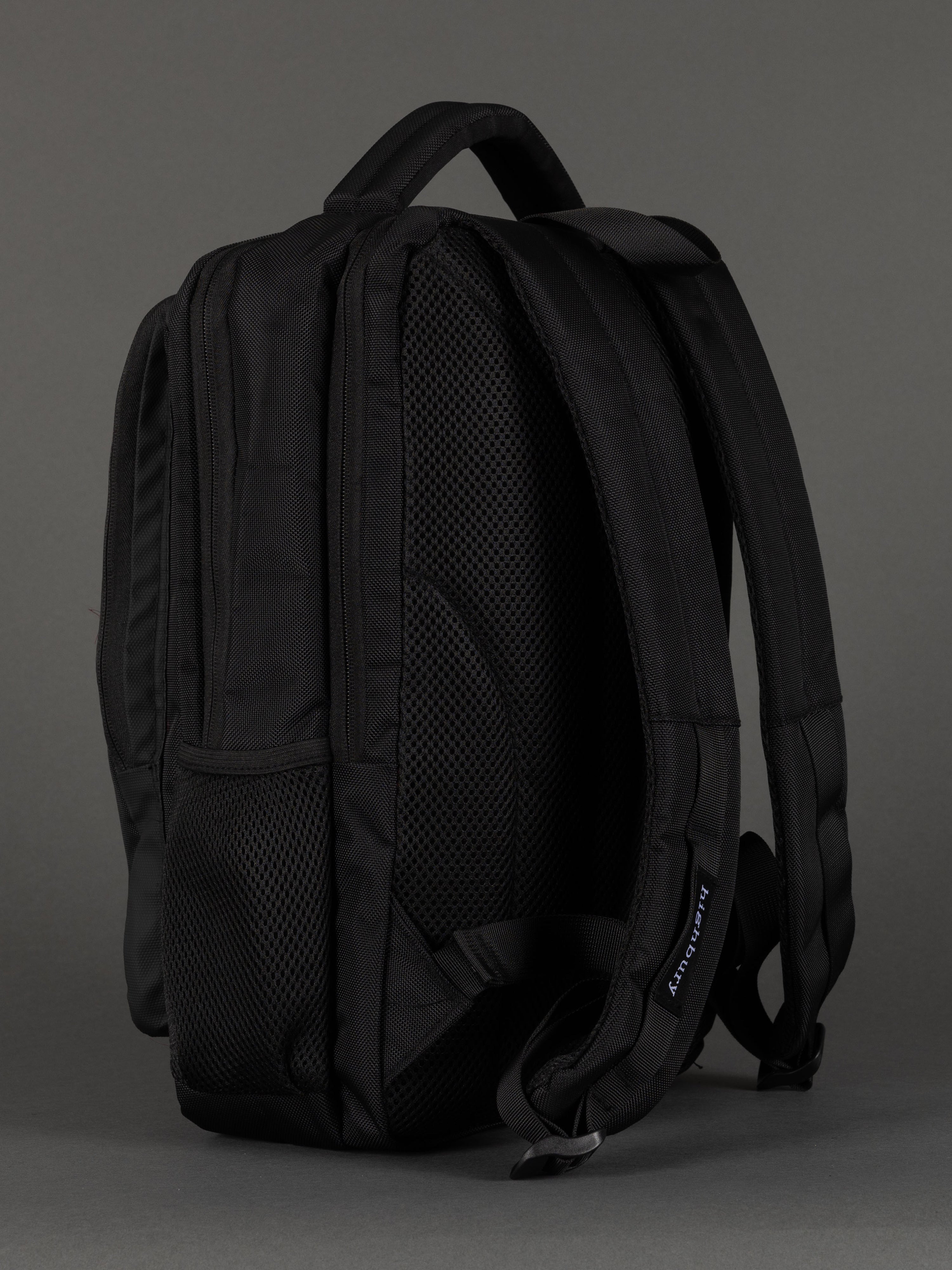 "Water-resistant black laptop backpack with padded section"