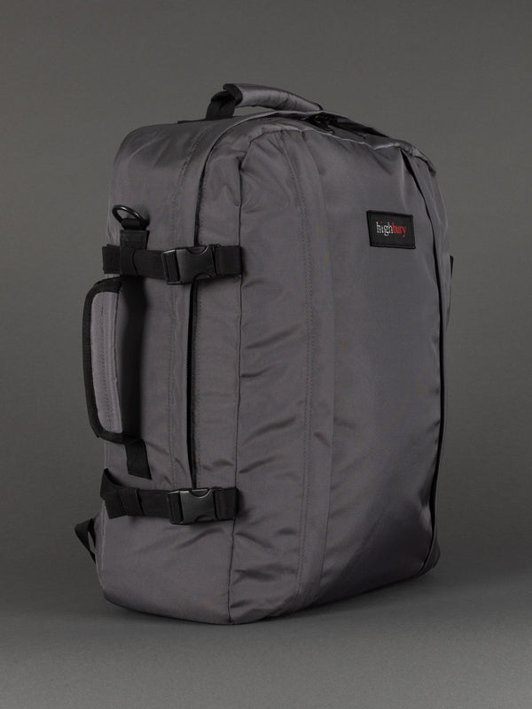 "Grey cabin-size travel backpack with padded laptop compartment"
