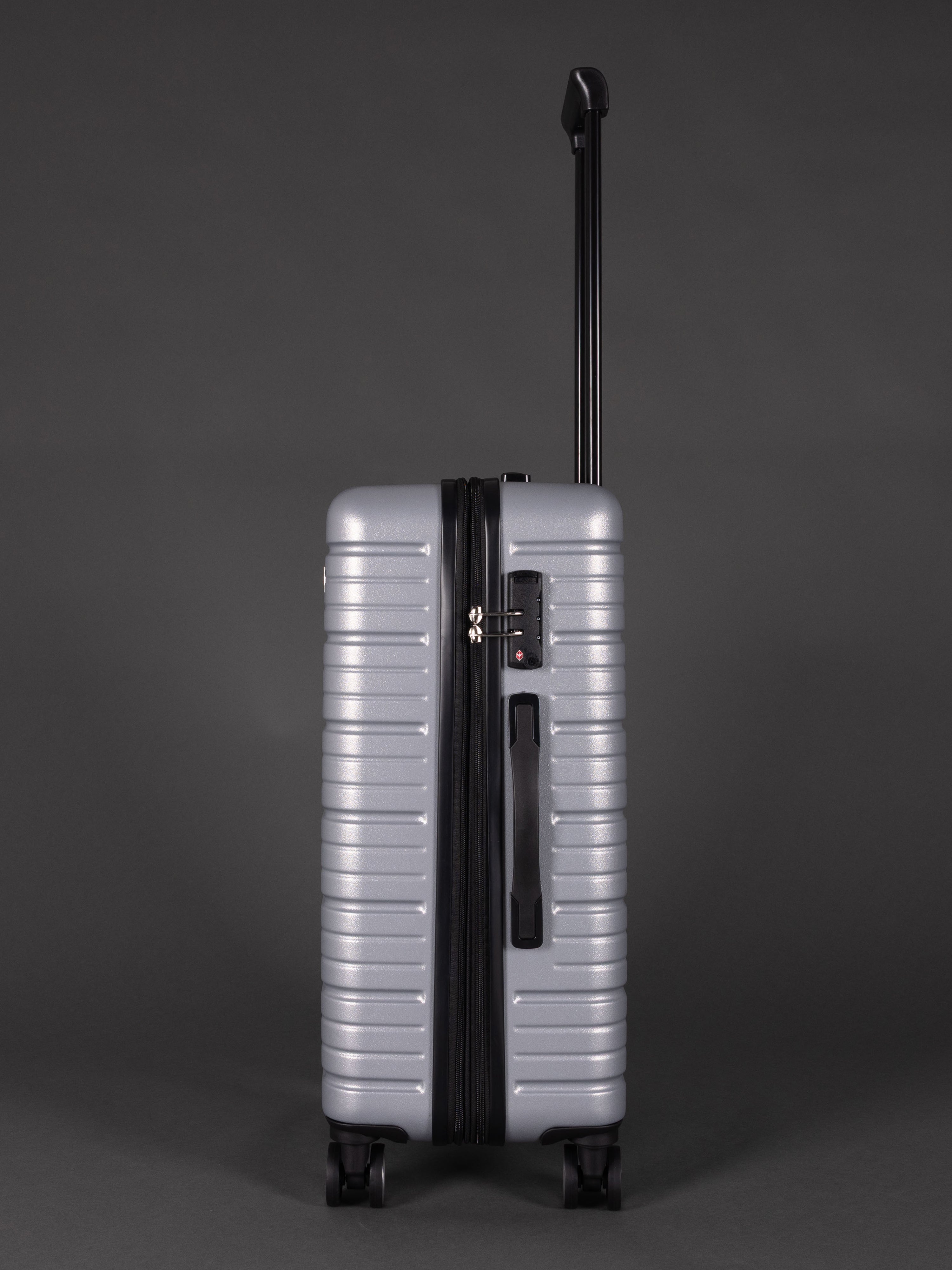 “Side view of expandable BEOW luggage showing 20% additional storage capacity”