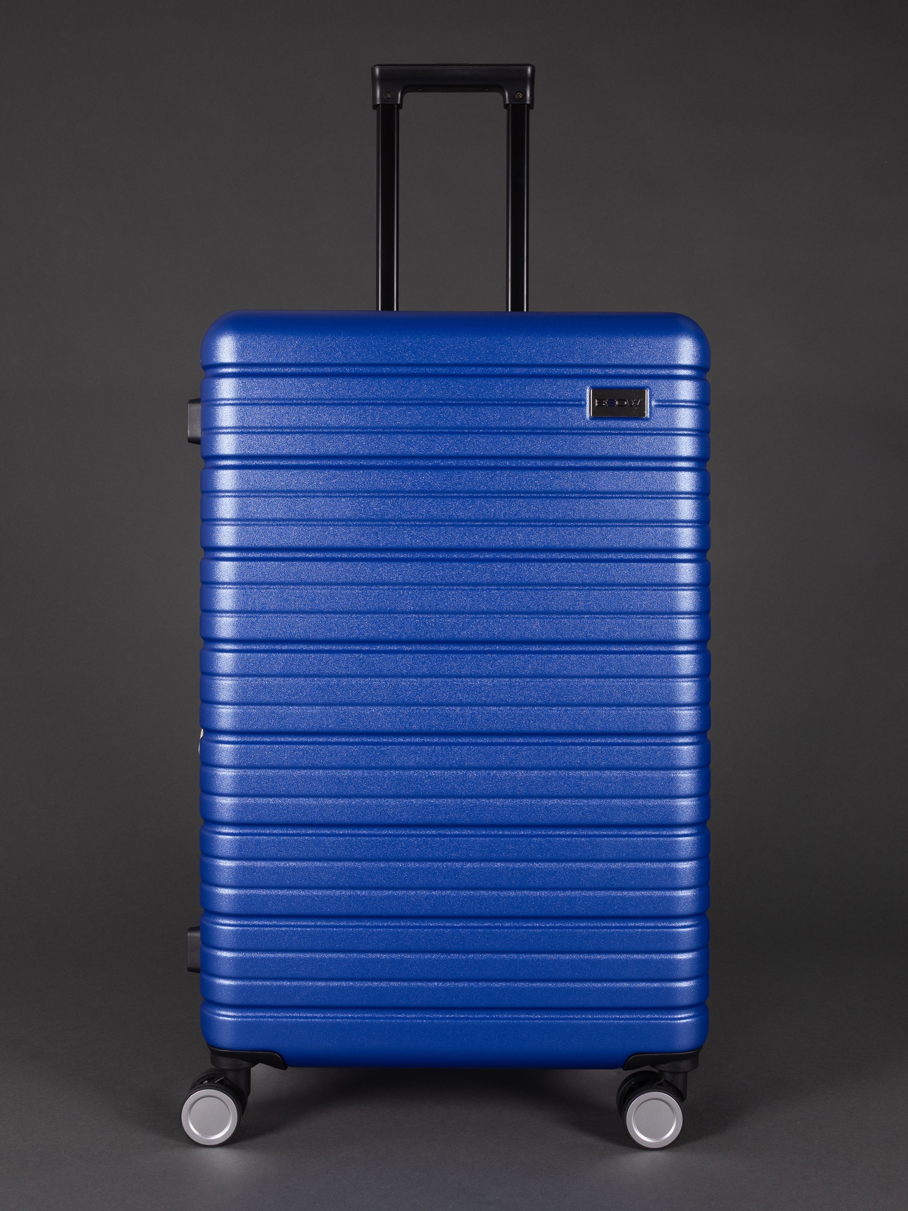 “Durable lightweight blue hard shell suitcase set with 20, 24, 28 inch sizes”