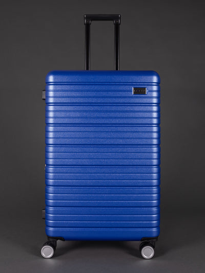 “Durable lightweight blue hard shell suitcase set with 20, 24, 28 inch sizes”