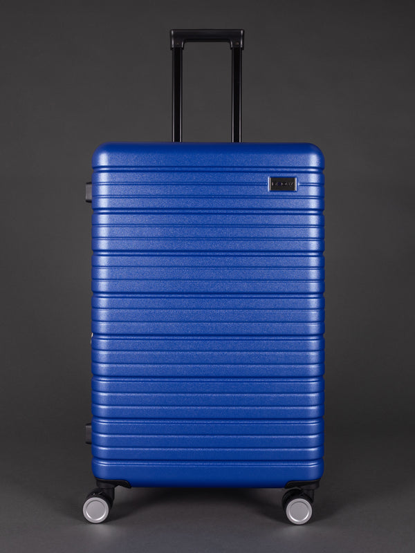 “Durable lightweight blue hard shell suitcase set with 20, 24, 28 inch sizes”