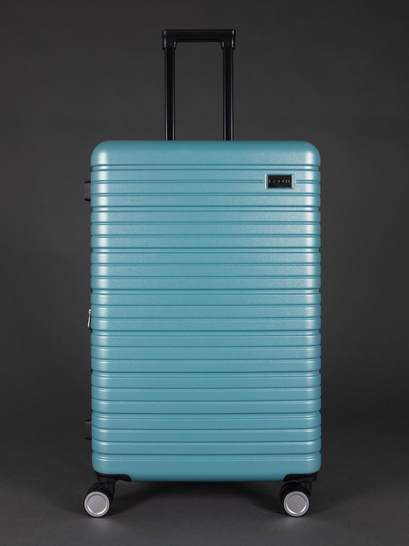 “Teal hard shell suitcase set with 20, 24, 28 inch sizes and spinner wheels”