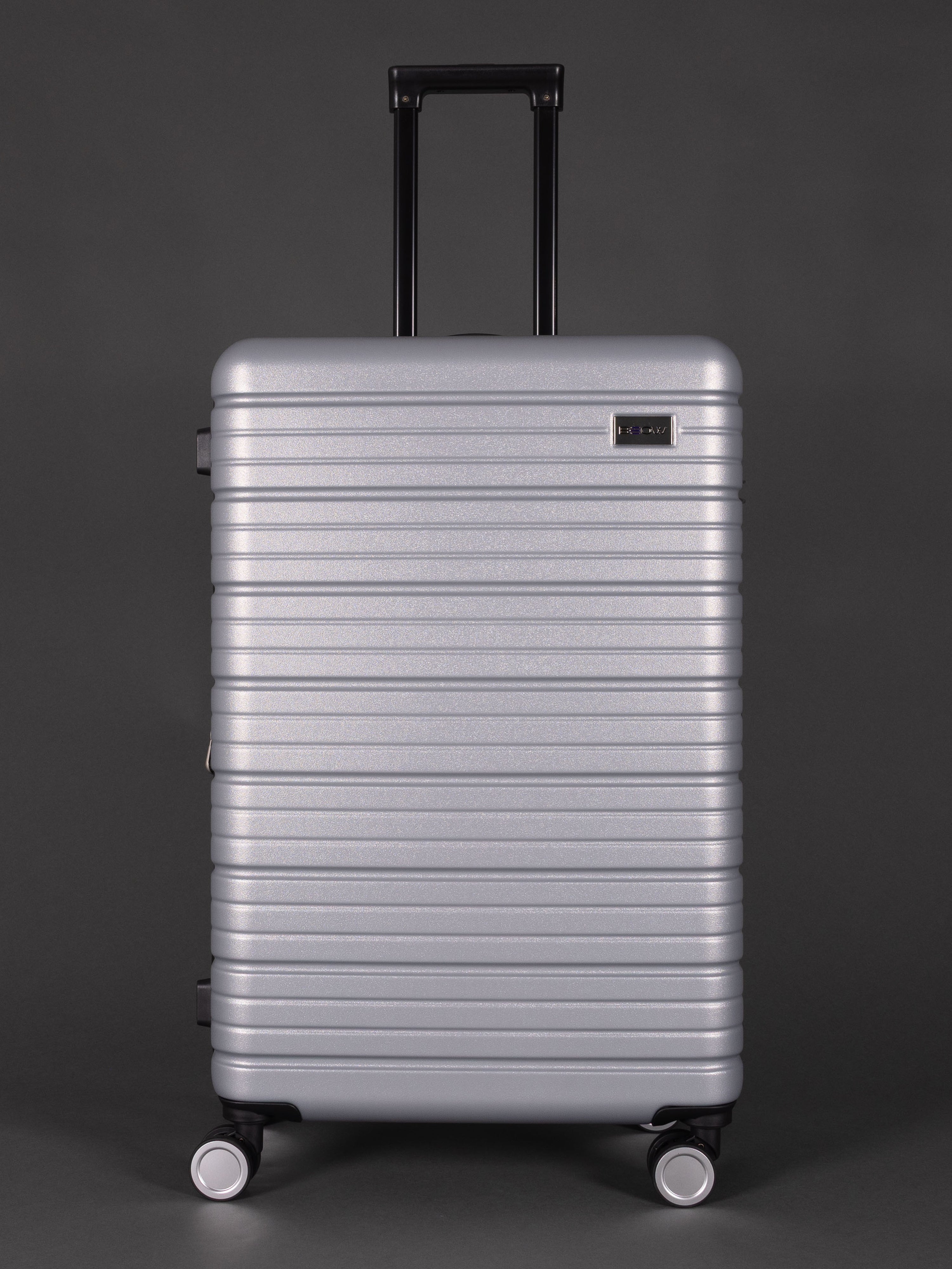“Sleek silver hard shell suitcase set – 3 piece with lightweight design”