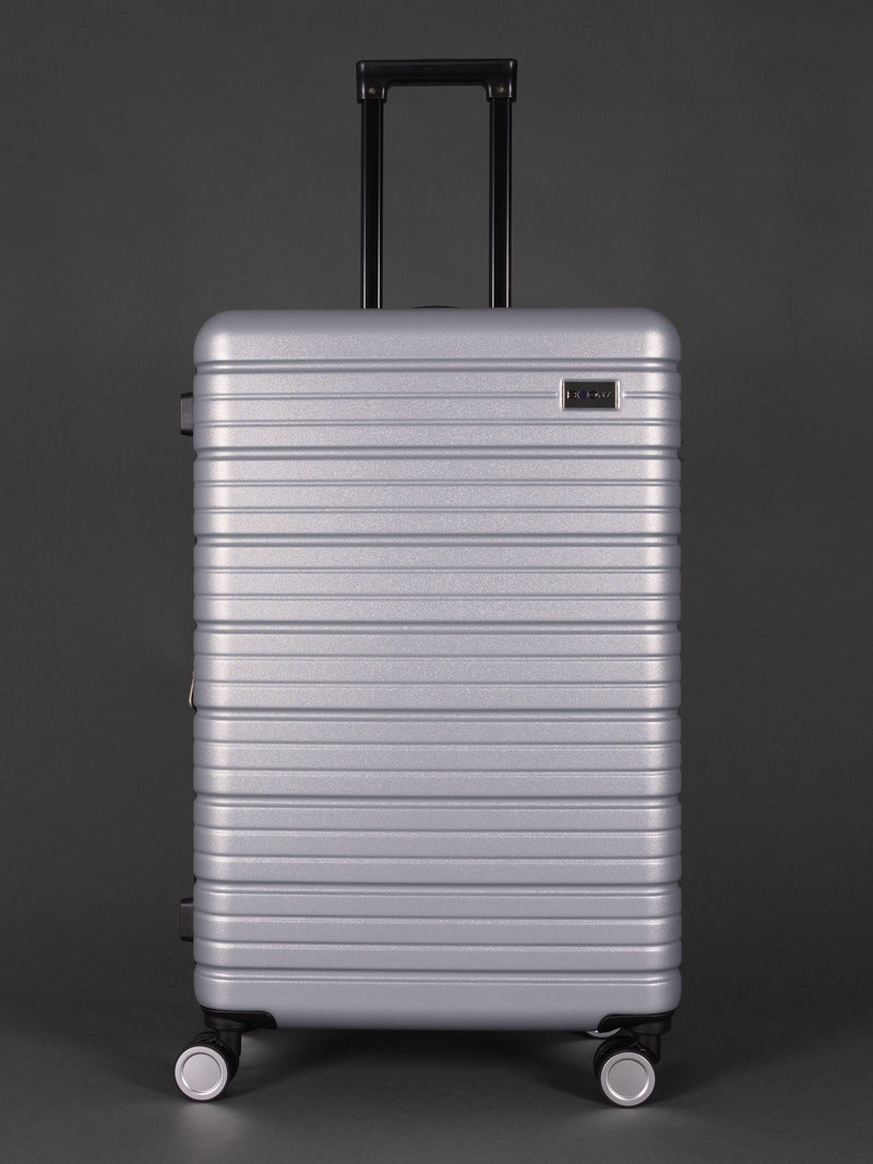 “Sleek silver hard shell suitcase set – 3 piece with lightweight design”