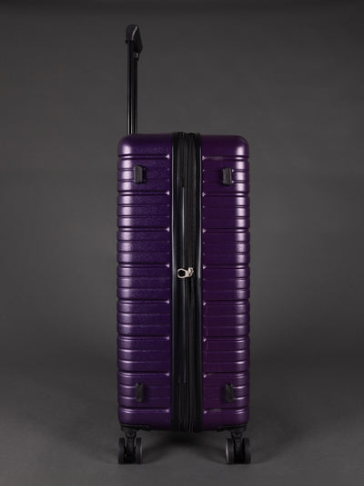 “Side view of expandable BEOW luggage showing 20% additional storage capacity”