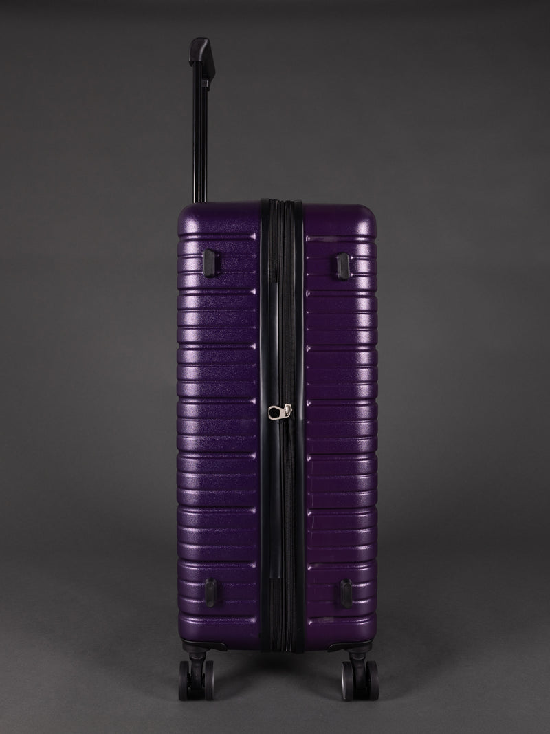“Side view of expandable BEOW luggage showing 20% additional storage capacity”