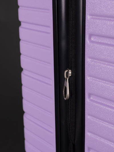 “Side view of expandable BEOW luggage showing 20% additional storage capacity”