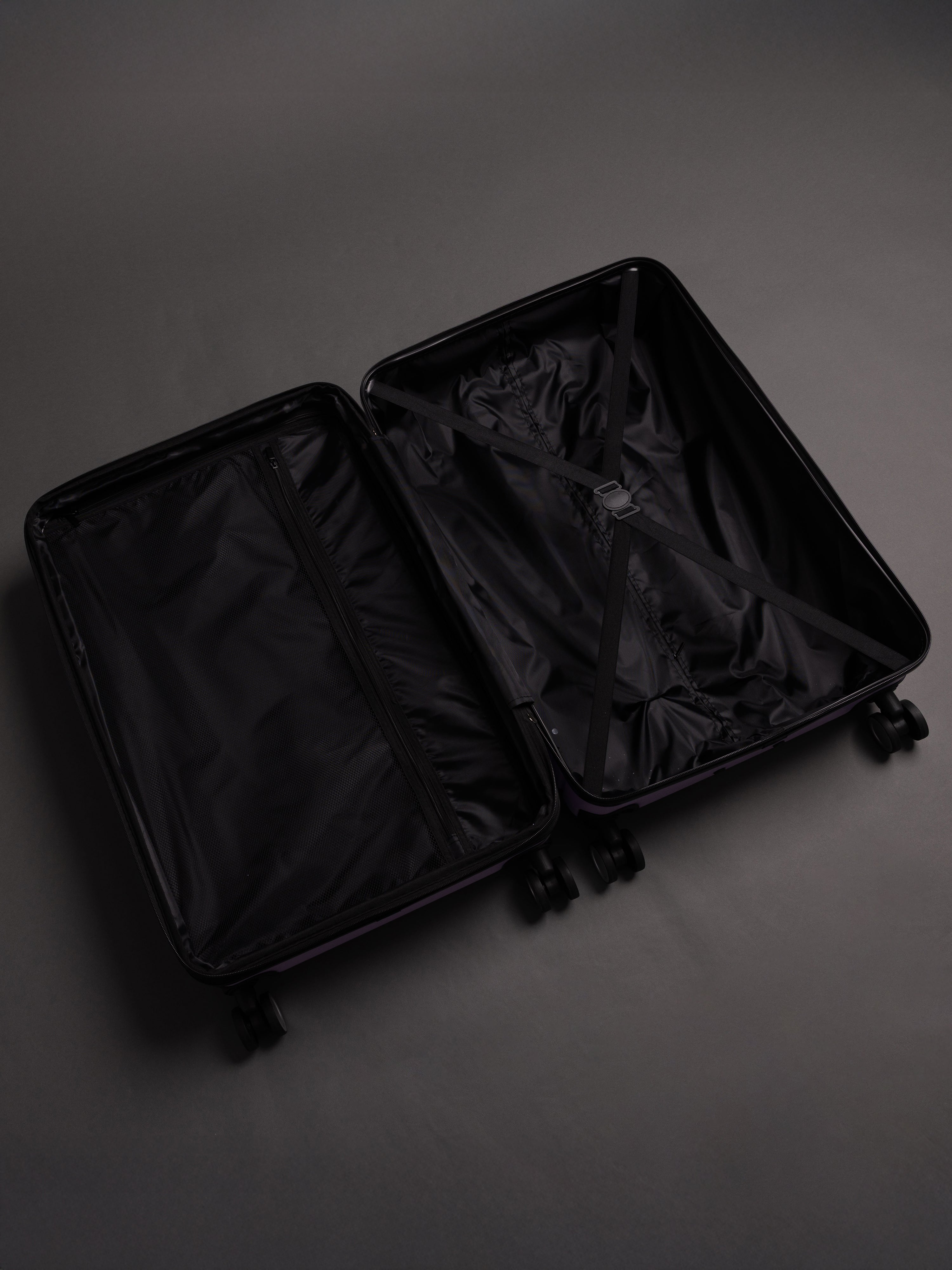 “Interior view of BEOW expandable suitcase with spacious compartments and elastic straps”