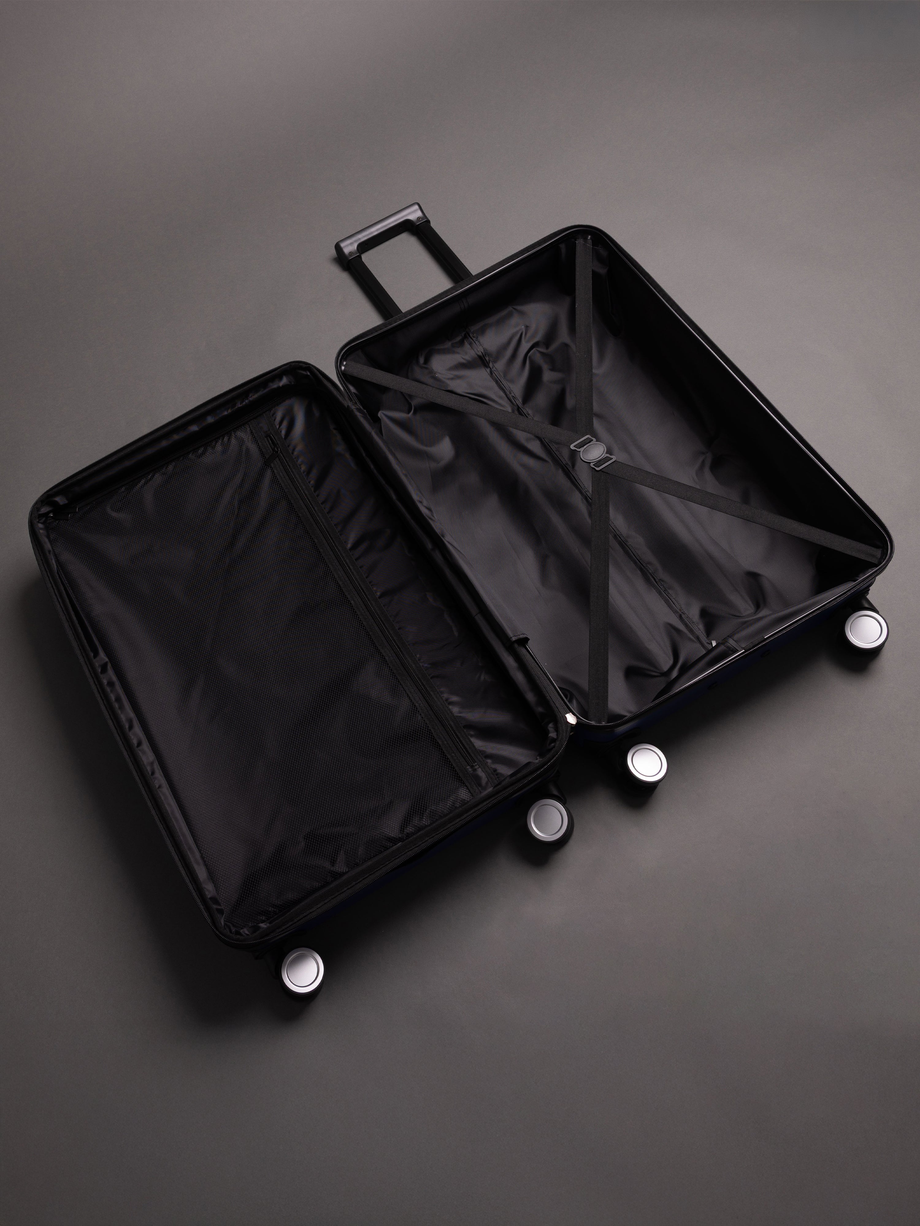 “Interior view of BEOW expandable suitcase with spacious compartments and elastic straps”