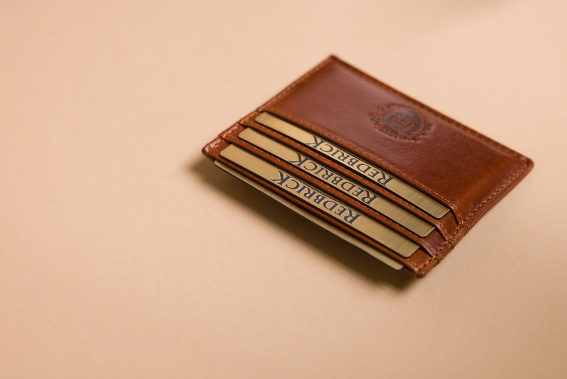 "Compact card holder in full-grain leather"