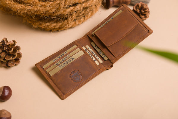 "Cognac leather wallet with engraved initials and coin pocket"