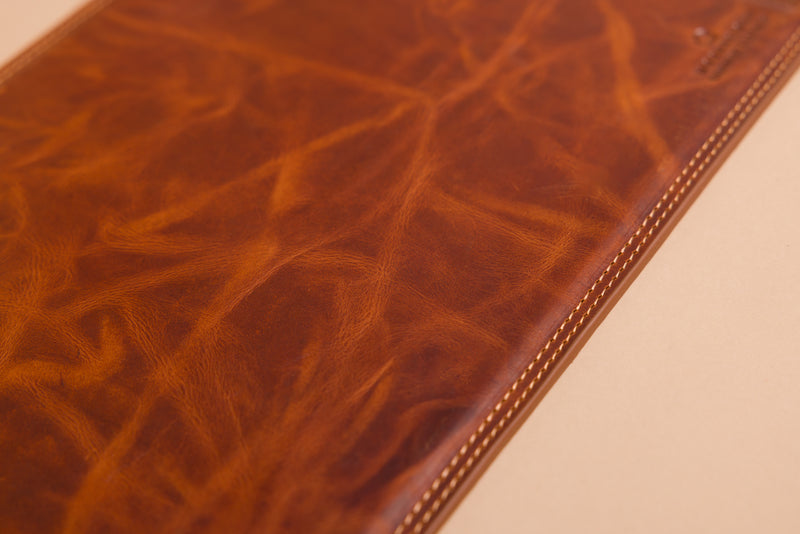 "Custom leather mouse mat on office desk"